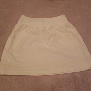 White ruffled skirt